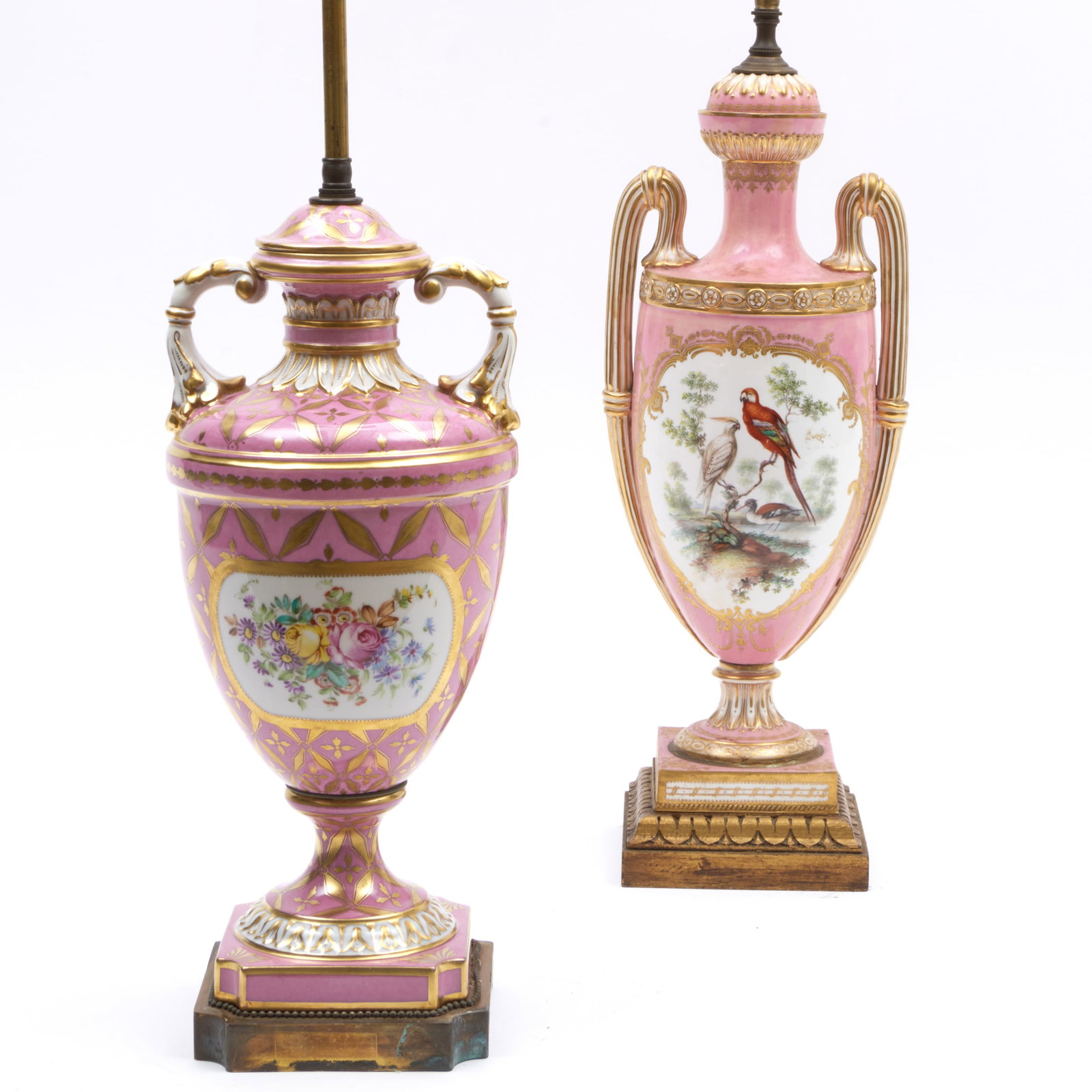 Two English Pink Ground Porcelain Jars and Covers Mounted as Lamps: Two English Pink Ground Porcelain Jars and Covers Mounted as Lamps The larger decorated with birds, the smaller decorated with flower bouquets. The larger 28 x 6 x 6 in. (to socket), the smaller 25 x