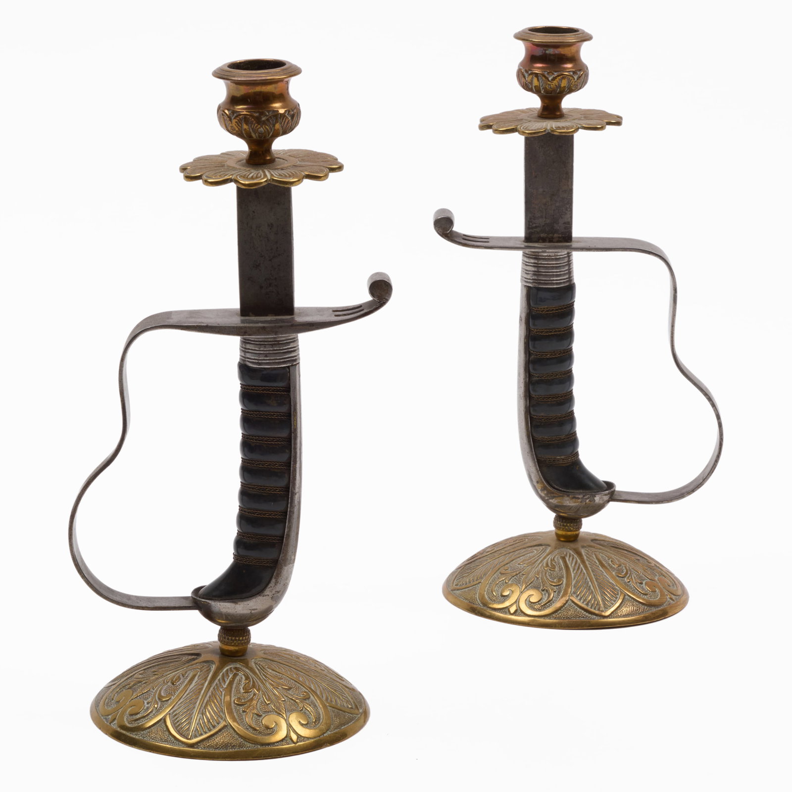 Pair of Steel and Brass Sword Handles Mounted as Candlesticks: Pair of Steel and Brass Sword Handles Mounted as Candlesticks 10 x 4 1/2 in. diam.