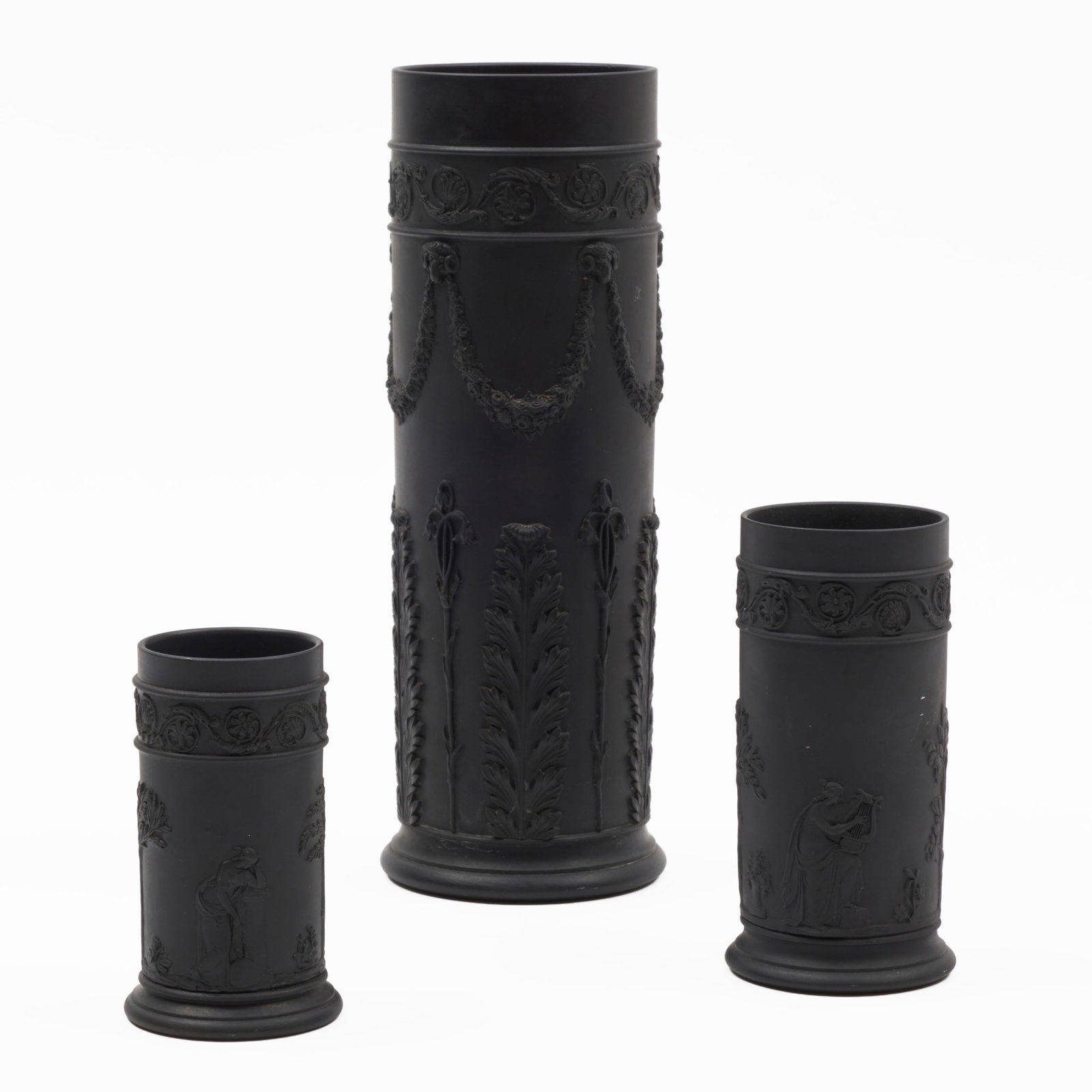 Group of Three Wedgwood Black Basalt Spill Vases: Group of Three Wedgwood Black Basalt Spill Vases Impressed mark.The tallest 9 1/2 x 3 in. diam., the shortest 4 x 1 7/8 in. diam. Property from a New York Private Collector