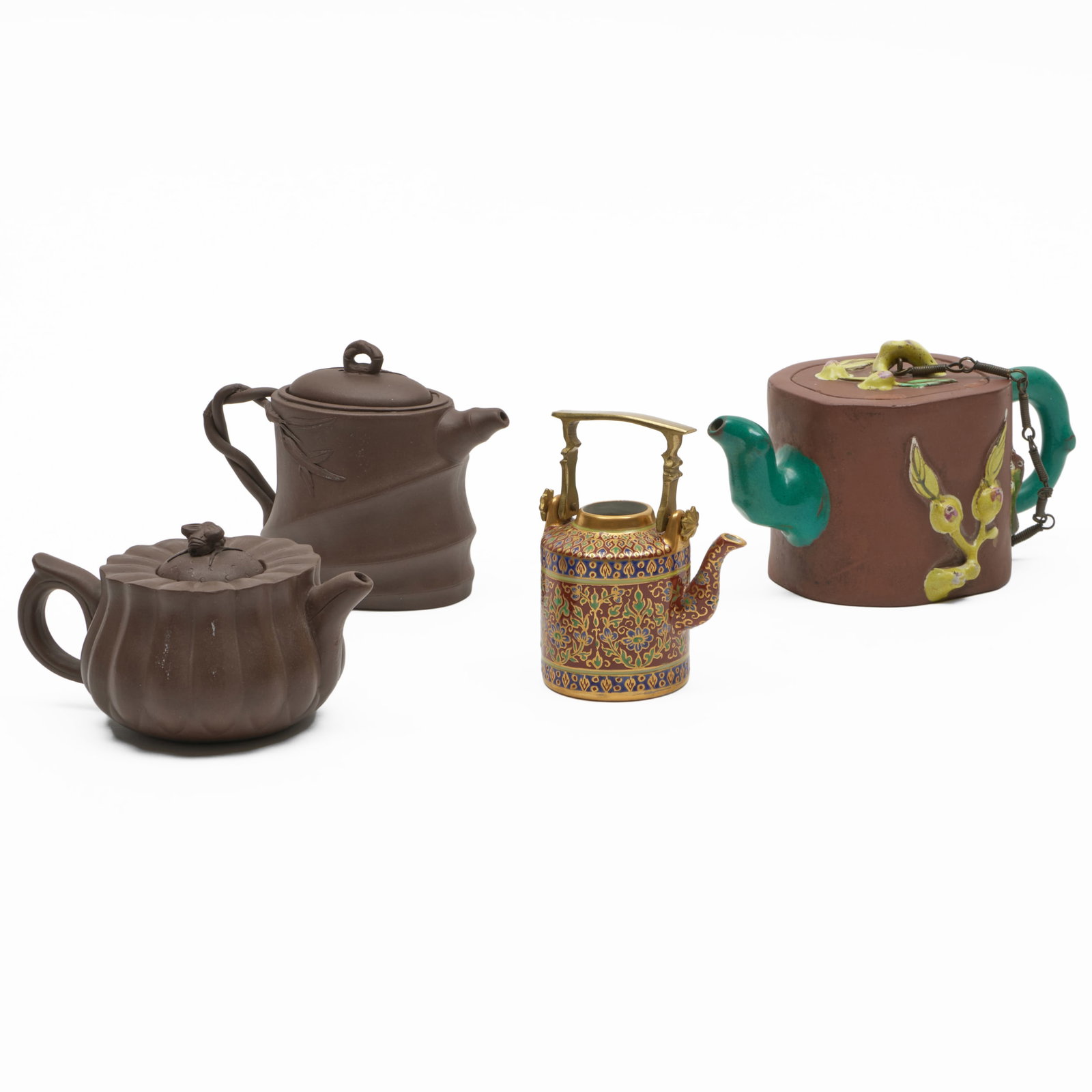Group of Four Chinese Teapots: Group of Four Chinese Teapots Comprising: A lobed Yixing teapot with fly form finial, impressed seal mark A bamboo Yixing teapot, impressed seal mark A painted Yixing teapot, impressed seal mark A gil