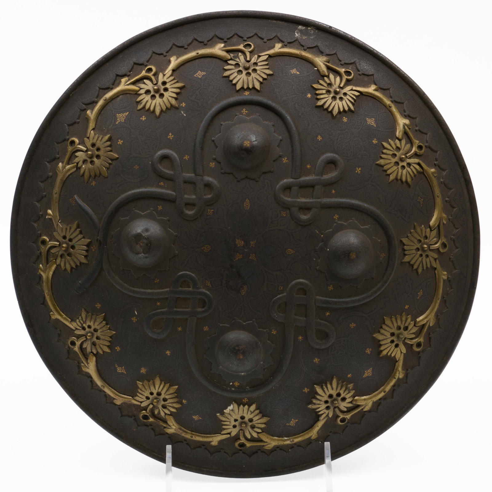 Indo-Persian Steel, Brass, and Parcel-Gilt Dhal Shield (1 of 5)