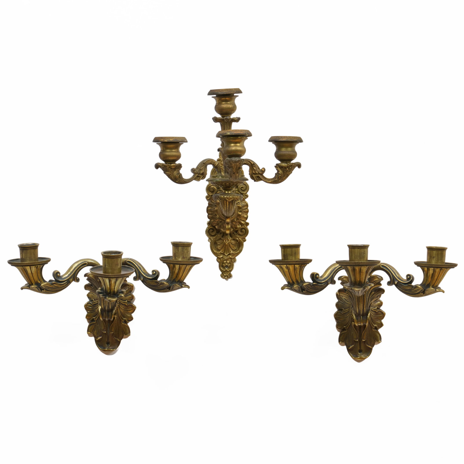 Pair of Victorian Brass Three Light Sconces and a Gilt-Metal Sconce: Pair of Victorian Brass Three Light Sconces and a Gilt-Metal Sconce The pair, 6 3/4 x 11 x 9 1/2 in.The single, 11 1/2 x 8 1/2 x 9 in. The Collection of James M. Labaugh Antiques, Pound Ridge, NY.