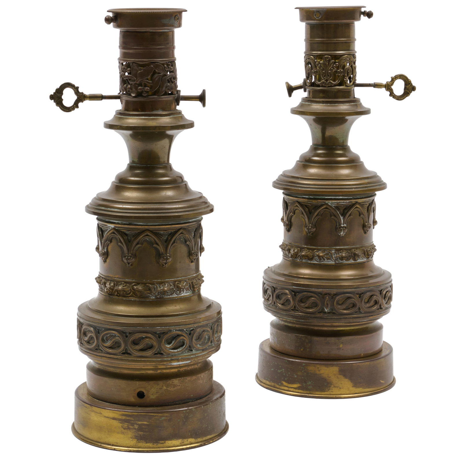 Pair of Neogothic Brass Oil Lamps: Pair of Neogothic Brass Oil Lamps 15 1/2 x 6 in. diam. The Collection of James M. Labaugh Antiques, Pound Ridge, NY.