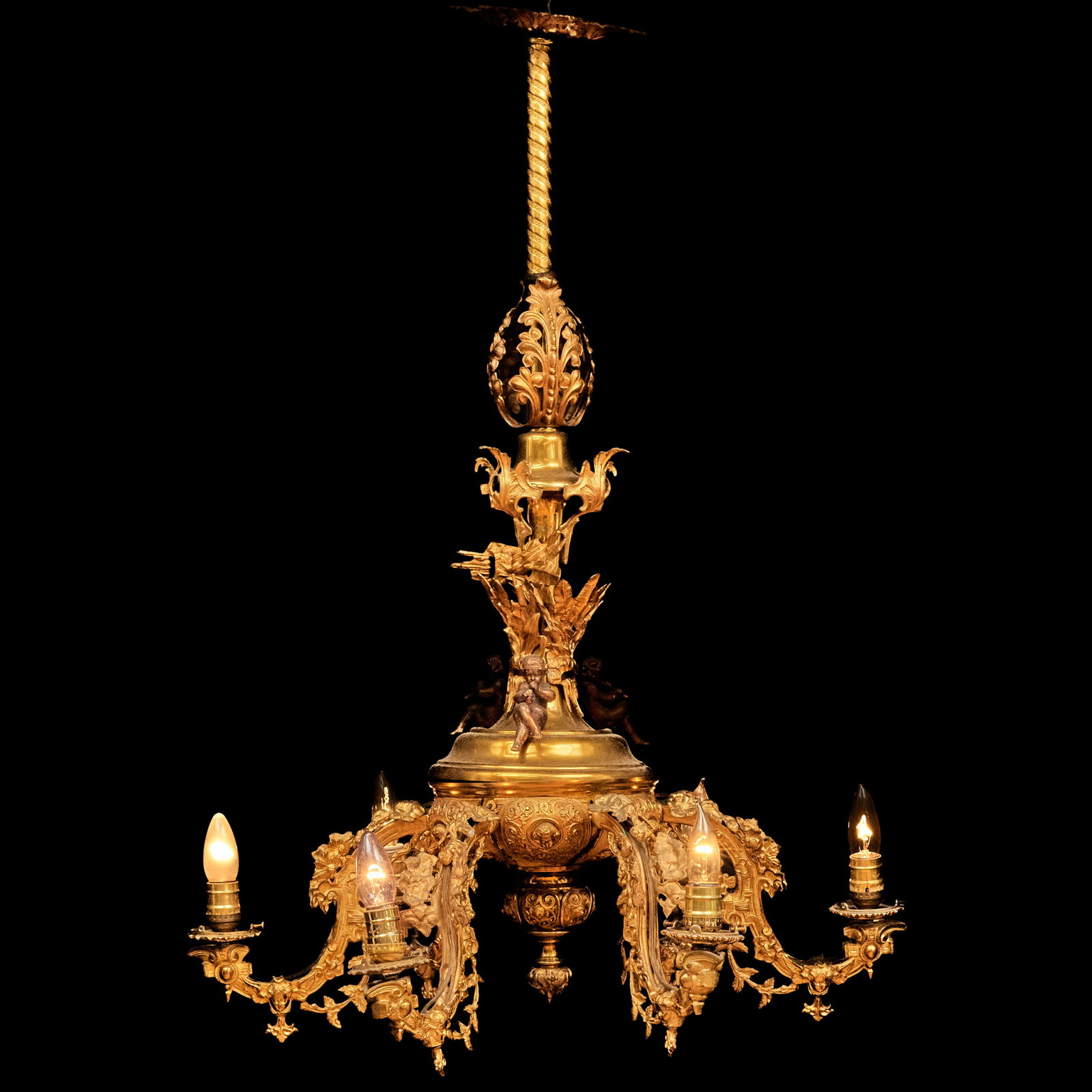 Elizabethan Revival Six Arm Figural Brass and Spelter Gasolier: Elizabethan Revival Six Arm Figural Brass and Spelter Gasolier Without shades.40 x 29 in. diam. Property from the Collection of Joan Bogart.
