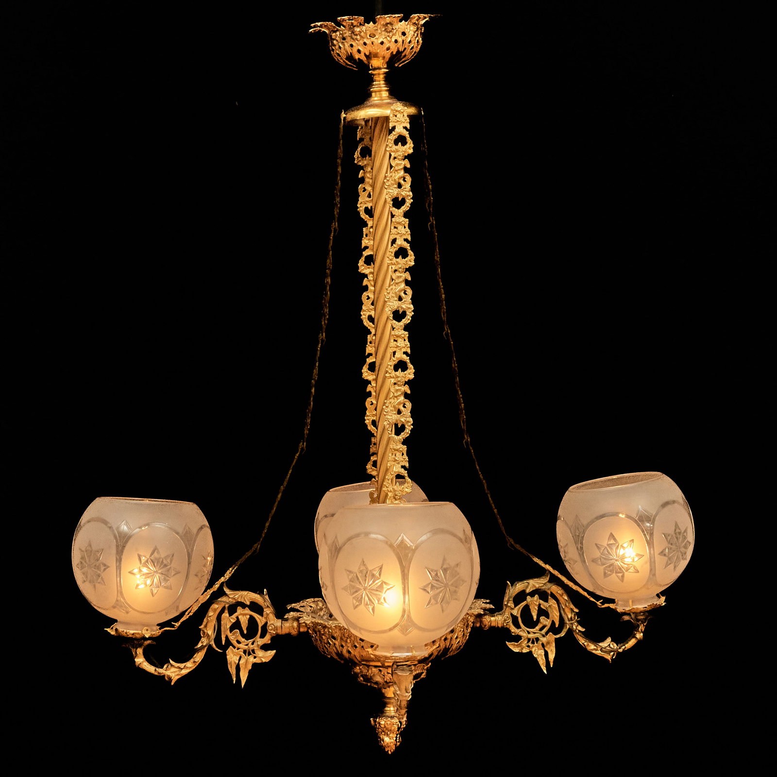 Rococo Revival Four Arm Brass Gasolier, Attributed to Cornelius: Rococo Revival Four Arm Brass Gasolier, Attributed to Cornelius With frosted and etched glass shades.38 x 37 in. diam. Property from the Collection of Joan Bogart.