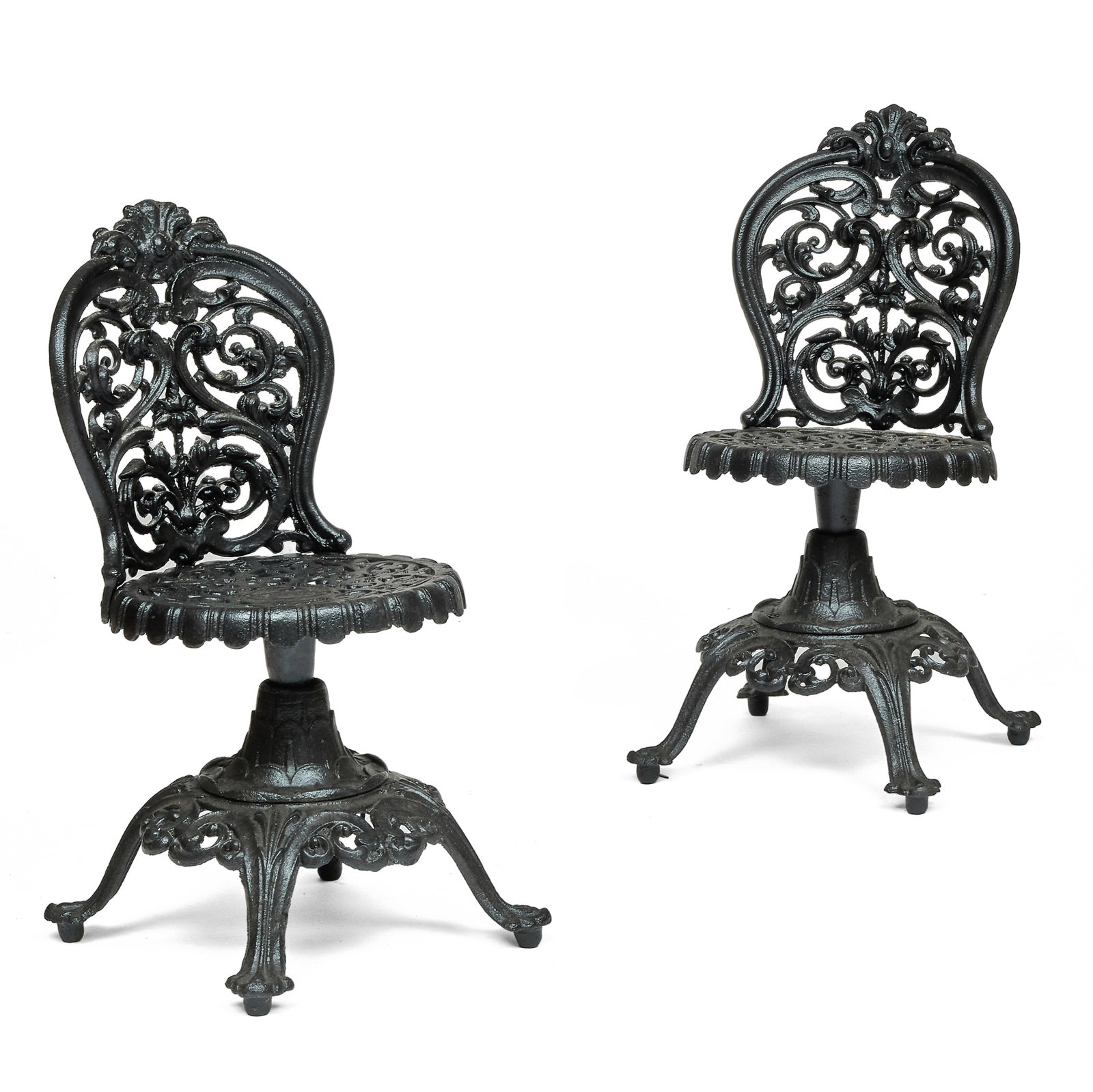 Pair of Victorian Cast Iron Swivel Chairs: Pair of Victorian Cast Iron Swivel Chairs 31 x 22 x 22 in., seat height 16 in. Property from the Collection of Joan Bogart.