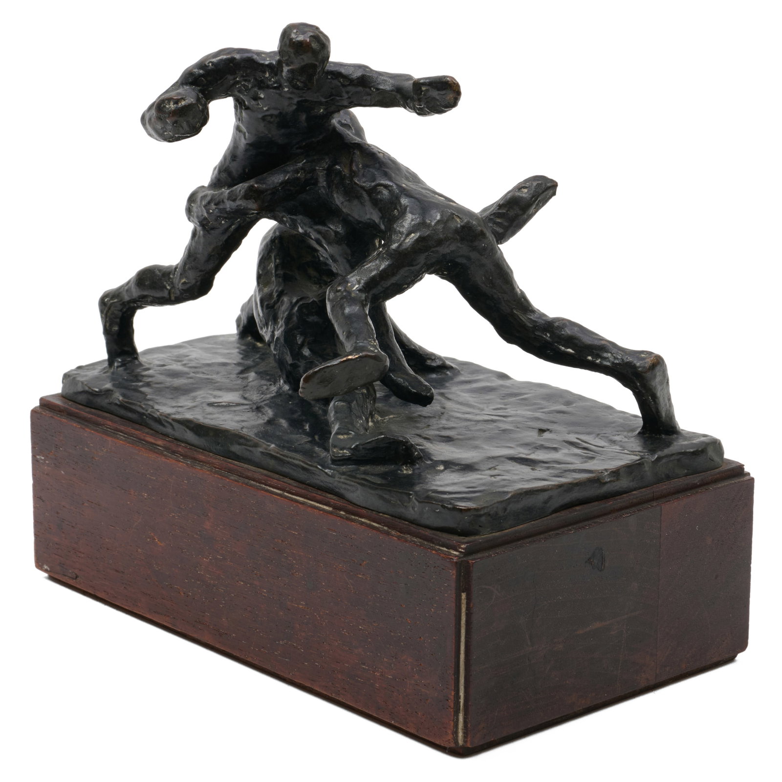 Harry Herman Wickey (1892-1968): Footballers: Harry Herman Wickey (1892-1968): Footballers Bronze, signed 'Wickey' at bottom, on a wood base. 7 x 7 1/2 x 4 1/2 in. (with base). The Collection of Roger S. Wieck and Jean-Francois Vilain: Sold to Be