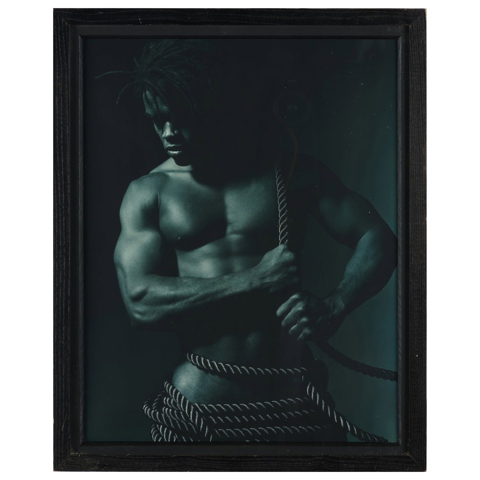 Len Price (b. 1953): Nigel with Rope: Len Price (b. 1953): Nigel with Rope Silver gelatin print, 1990, signed and inscribed 'Blue' on the reverse, numbered 1/25 on the artist's label. 19 1/2 x 15 1/2 in. (sheet), 21 x 17 in. (frame). The 