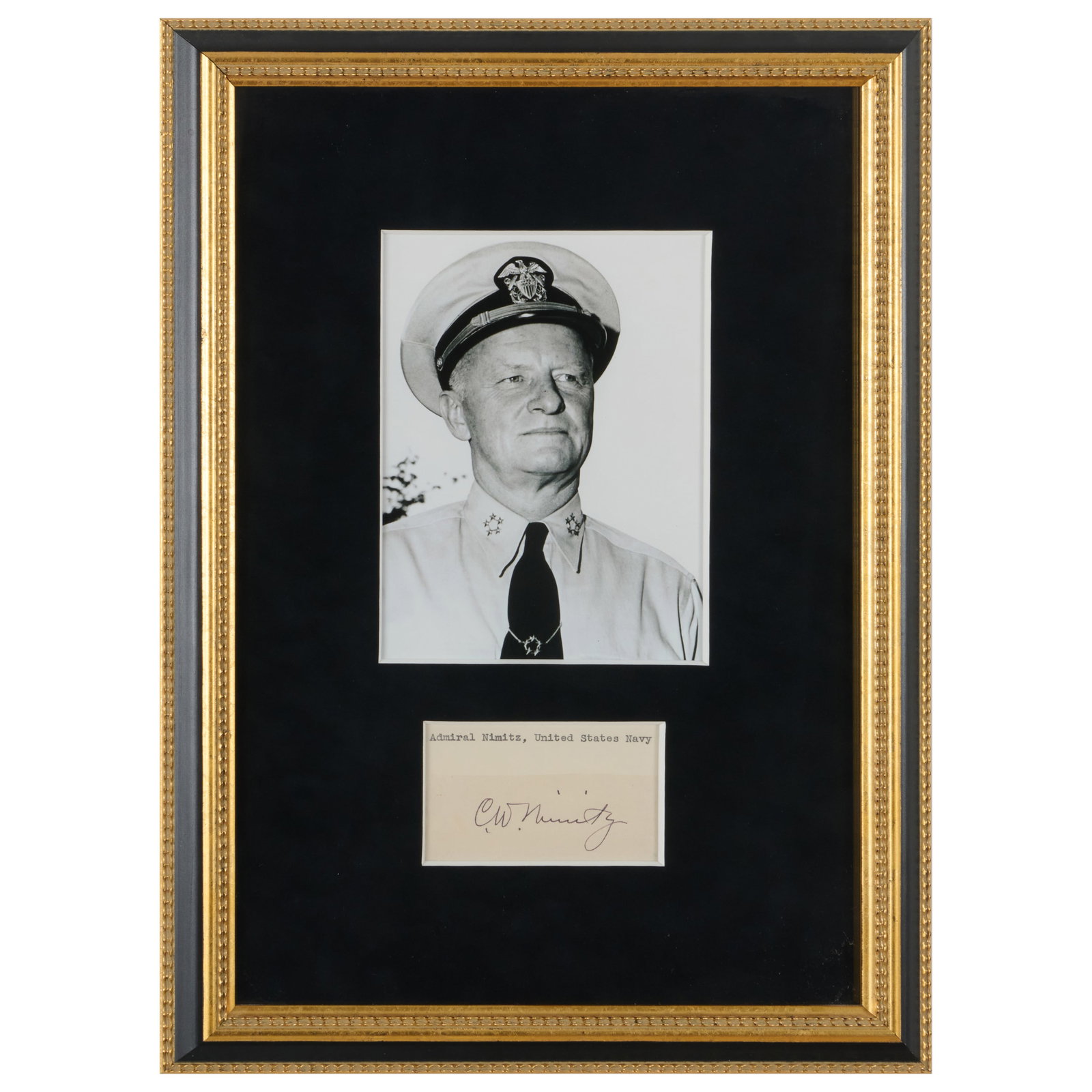 Admiral Chester W. Nimitz Signature with Photograph: Admiral Chester W. Nimitz Signature with Photograph Typing and pen on paper 'C.W. Nimitz'; mounted in frame.The signature 2 1/4 x 3 1/2 in. (sight), 6 3/4 x 4 3/4 in. (sight), 17 x 11 3/4 in.
