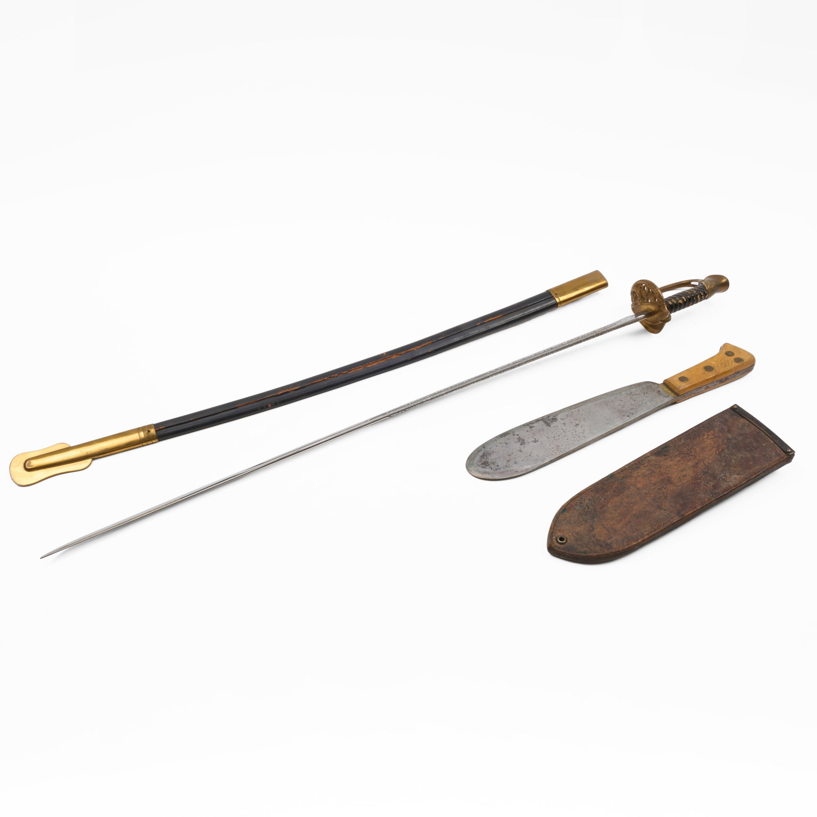 USMC NCO Sword and a WWII USMC Hospital Corpsman Bolo Knife: USMC NCO Sword and a WWII USMC Hospital Corpsman Bolo Knife The first by N.S. Meyer Inc, 1950s with etched blade; the second with scabbard dated 1943 and stamped 'Boyt'.The first 32 in. long (blade),