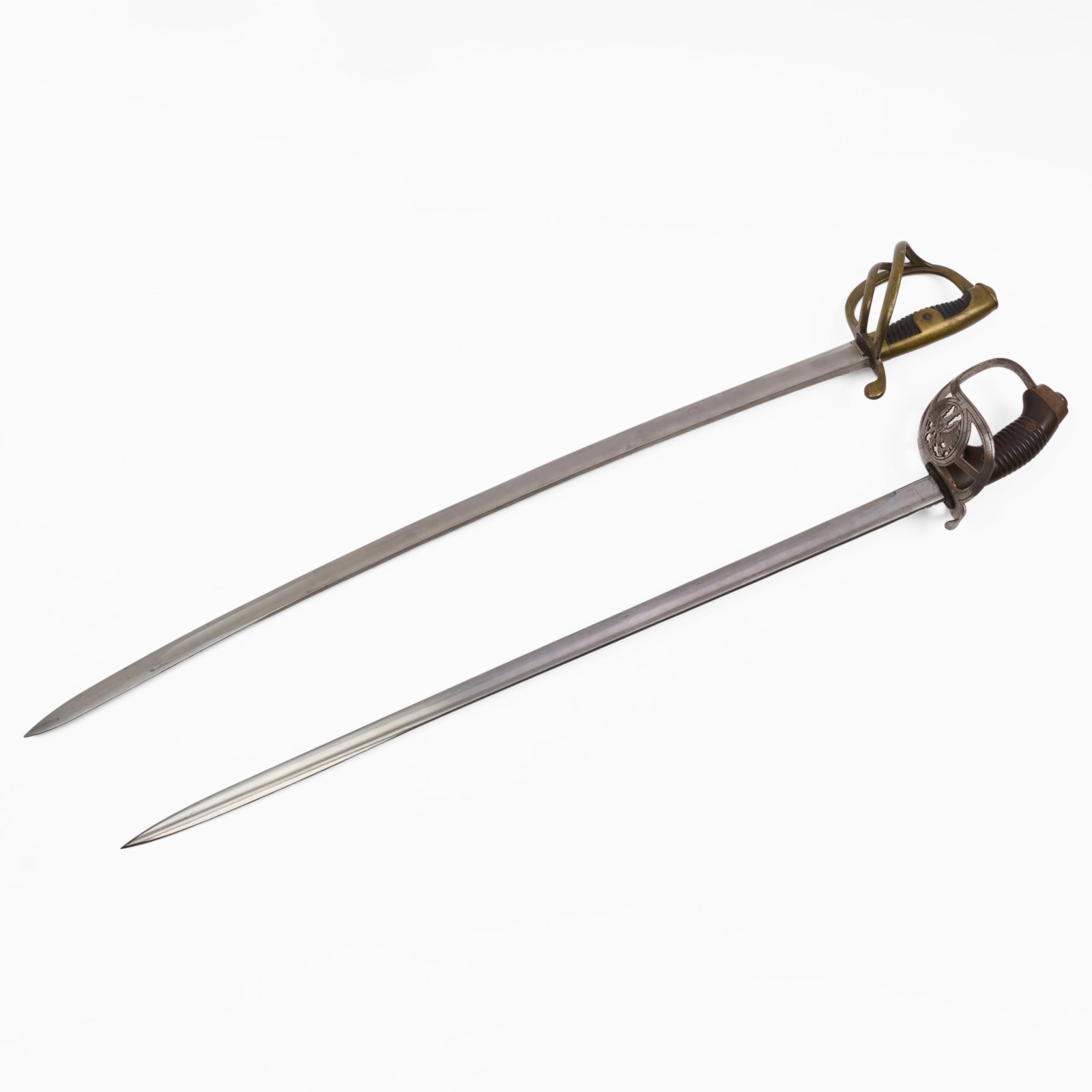Two German Cavalry Swords: Two German Cavalry Swords The first an Imperial M1889 Hussar Calvary sword, stamped 'P.D. Luneschloss Solingen'; the second M1858 Calvary trooper's sword (saber), probably WWI.The first 32 1/4 in.