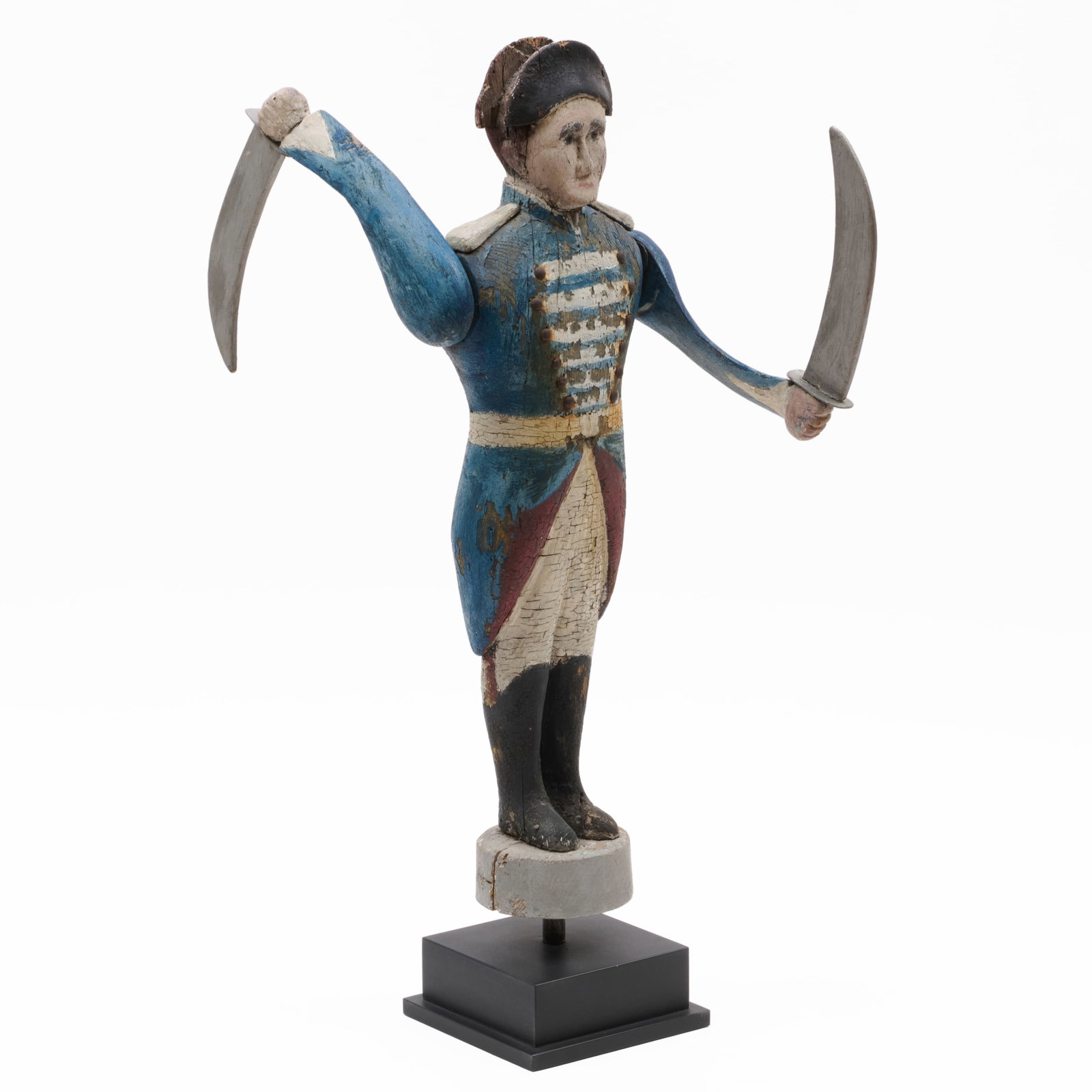 Carved and Polychromed Wood Whirligig of a Soldier: Carved and Polychromed Wood Whirligig of a Soldier On custom stand.The figure 23 x 9 x 16 in., 26 1/2 x 9 x 16 in. (overall). Sourced from New Haven, CT.Allan Katz Americana, Woodbridge, CT, November