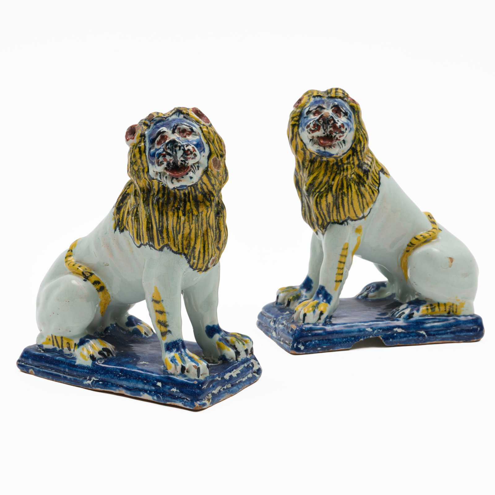 Pair of French Faience Model of a Lion: Pair of French Faience Model of a Lion Unmarked.7 1/2 x 6 x 3 1/4 in.
