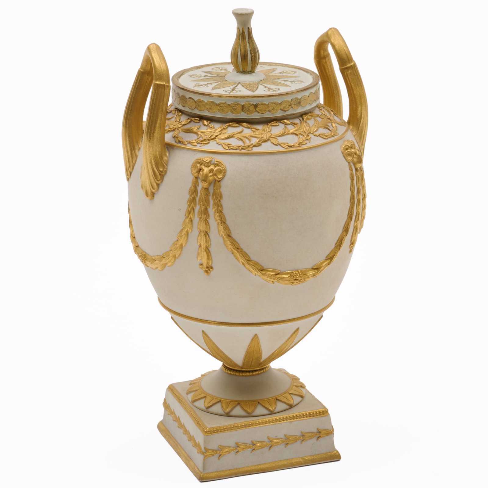 Wedgwood Gilt Decorated Porcelain Urn And A Cover: Wedgwood Gilt Decorated Porcelain Urn And A Cover Impressed mark.9 1/4 x 5 in. diam. Property from the Collection of a Distinguished NY Lady, with Interiors by Alex Papachristidis.