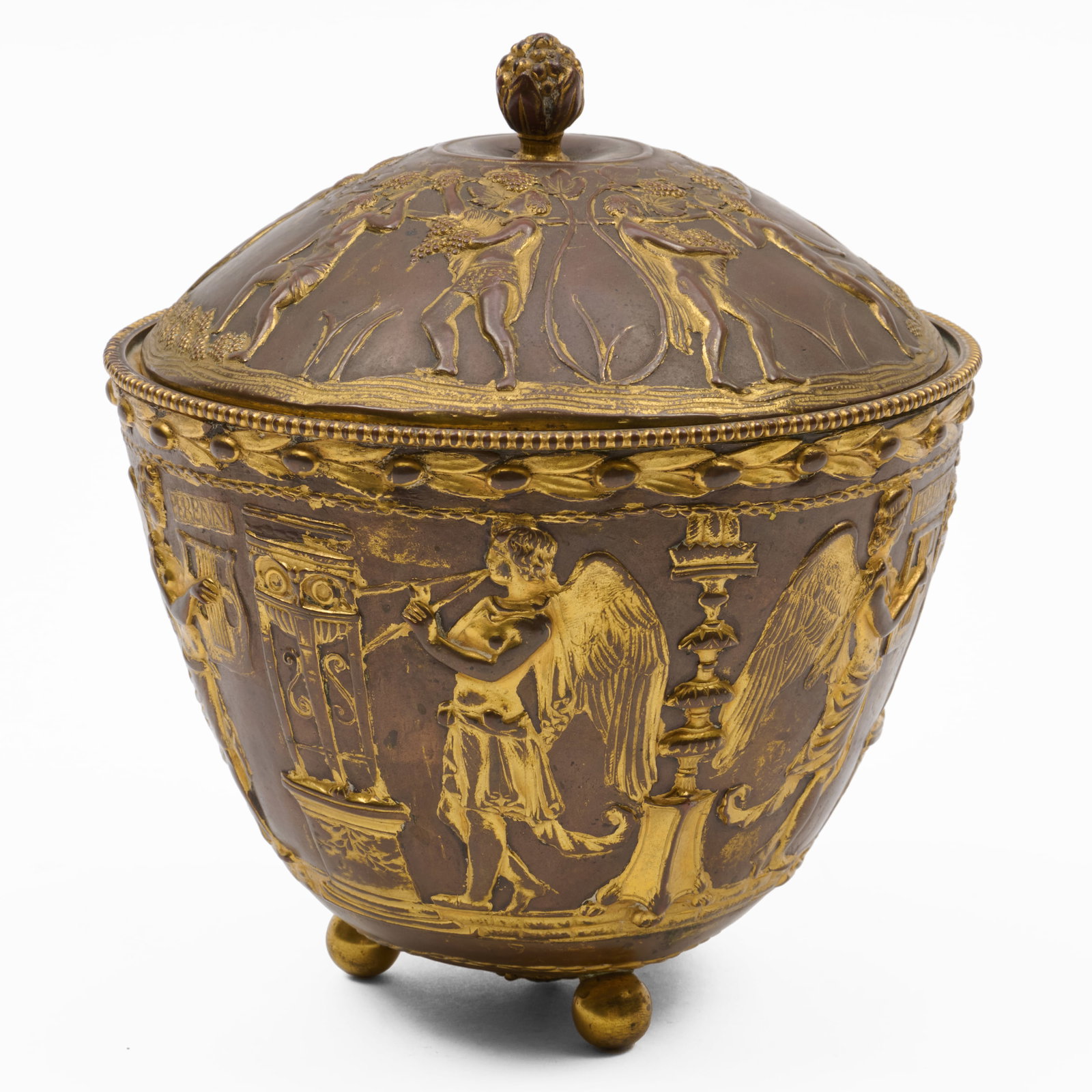 Gilt-Metal Vessel In The Grecian Taste: Gilt-Metal Vessel In The Grecian Taste Marked PERENNI. 7 1/2 x 7 1/2 in. diam. Property from the Collection of a Distinguished NY Lady, with Interiors by Alex Papachristidis.