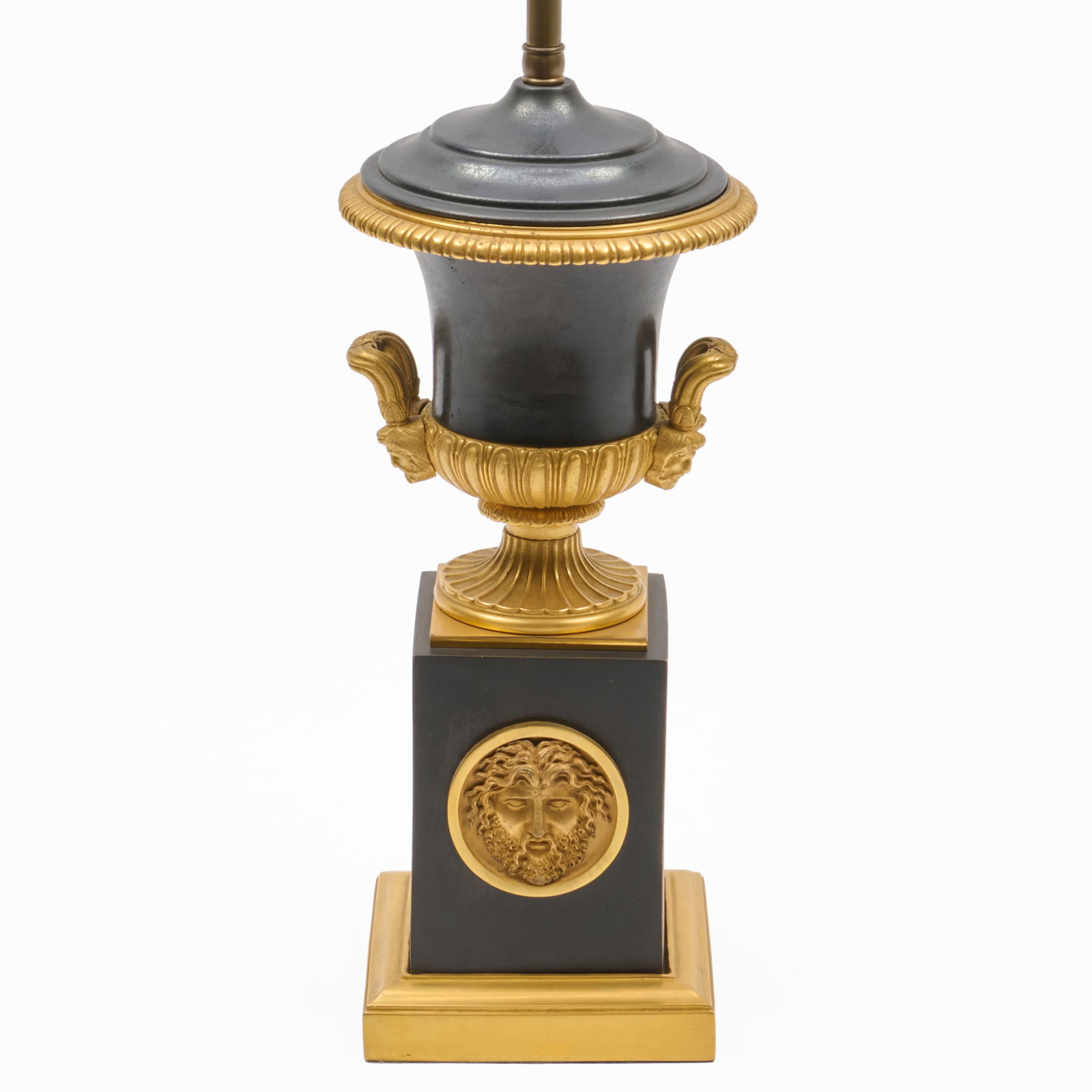 Empire Style Gilt And Patinated-Bronze Vase Mounted As A Lamp: Empire Style Gilt And Patinated-Bronze Vase Mounted As A Lamp 14 1/4 x 5 1/8 x 5 1/8 in., to top of covered urn.Overall height 24 3/4 in. Property from the Collection of a Distinguished NY Lady, with 