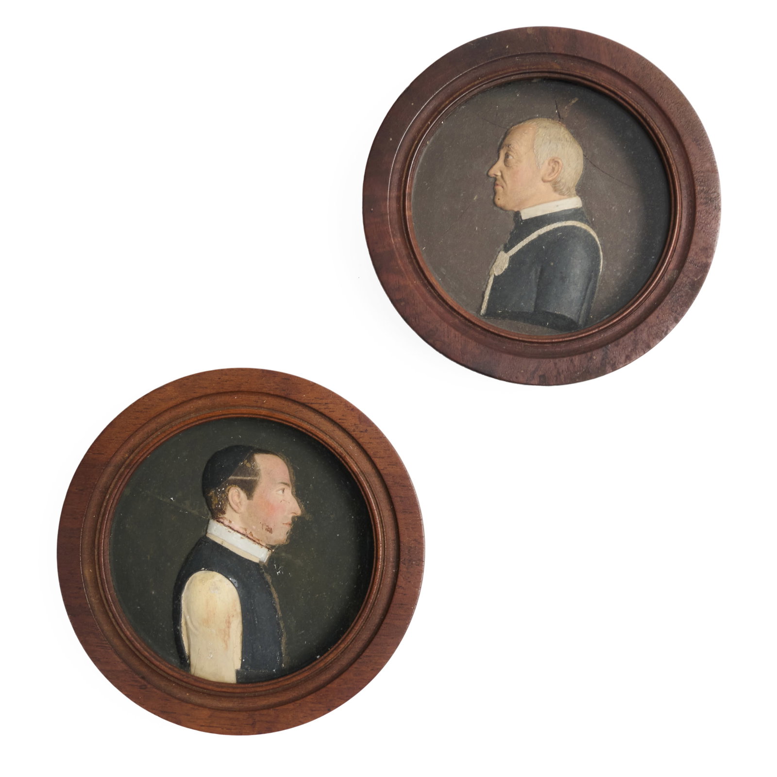 Two German Polychromed Portrait Reliefs: Two German Polychromed Portrait Reliefs Inscribed in pencil on the reverse.5 1/4 in. diam. (frame). The Collection of James M. Labaugh Antiques, Pound Ridge, NY.