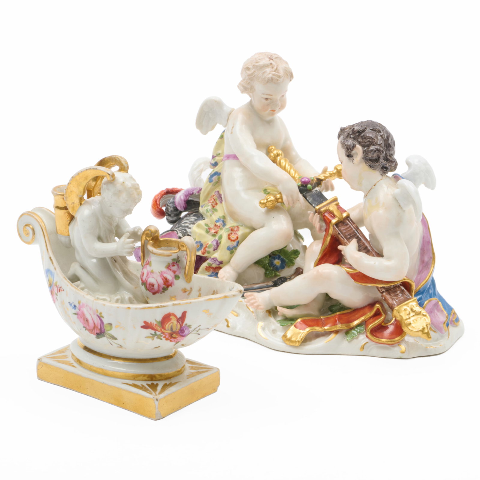 Putti Porcelain Figure Group And A Putti Inkwell, Probably English: Putti Porcelain Figure Group And A Putti Inkwell, Probably English Unmarked.The group 5 1/2 x 6 3/4 x 4 in., the inkwell 4 3/4 x 5 1/2 x 2 1/4 in. The Collection of James M. Labaugh Antiques, Pound