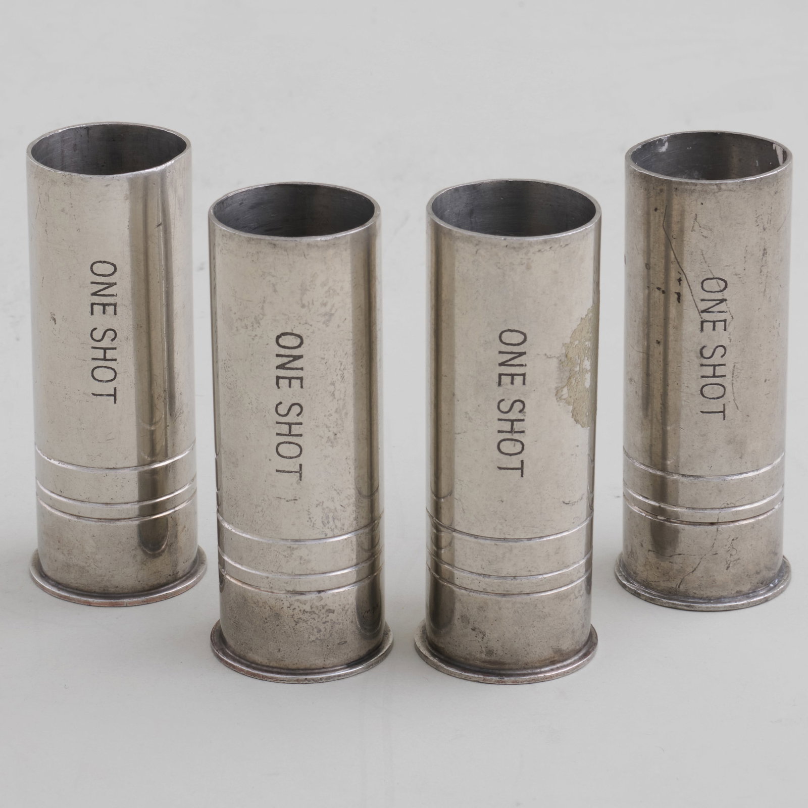 Set of Four Brooks Brothers Metal Cartridge Form 'Shot' Cups: Set of Four Brooks Brothers Metal Cartridge Form 'Shot' Cups 3 1/2 x 1 7/8 in. diam.