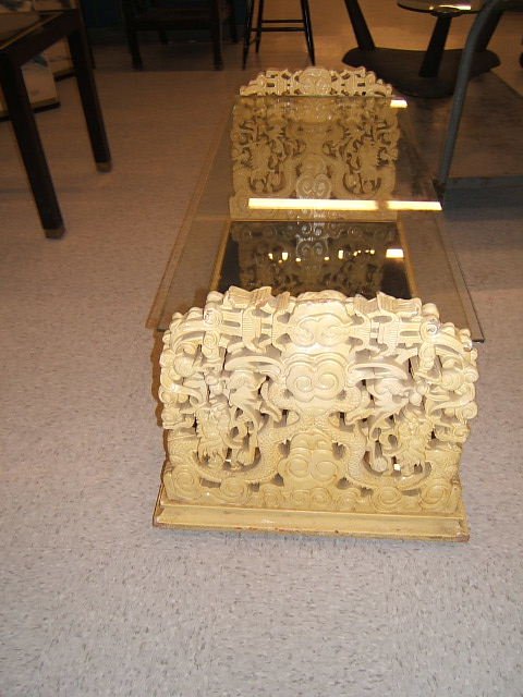 ELABORATELY CARVED GLASS TOP TABLE
