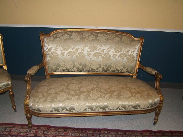 3 PIECE CARVED AND GILT PARLOR SET: 3 PIECE CARVED AND GILT PARLOR SET INCLUDING SETTEE AND 2 CHAIRS - 37" HIGH, 57" LONG, 28" DEEP SETTEE, 35" HIGH ARM AND 36" SIDE CHAIR, MARS TO UPHOLSTERY, SOME WEAR, LOSS TO GILT / DECORATION, SOME