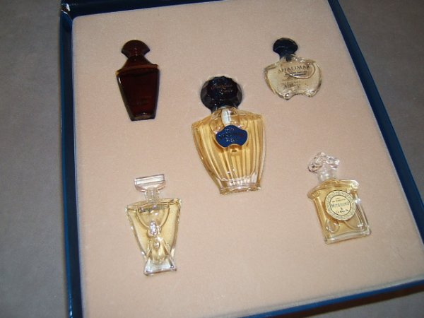 COLLECTOR EDITION GUERLAIN FRAGRANCES: COLLECTOR EDITION GUERLAIN FRAGRANCES - These are larger than tiny minis. Shalimar (their most signature fragrance);treasured fragrances of Mitsouko, Samsara & Champs Elysee. ****** PLEASE NOTE -FOR T