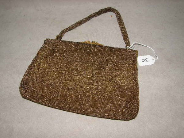 VINTAGE BEADED HANDBAG WITH METAL FRAME: VINTAGE BEADED HANDBAG WITH METAL FRAME -MADE IN BELGIUM - 5 1/2" X 8" - SOME WEAR, BEAD LOSS, WEAR TO FINISH