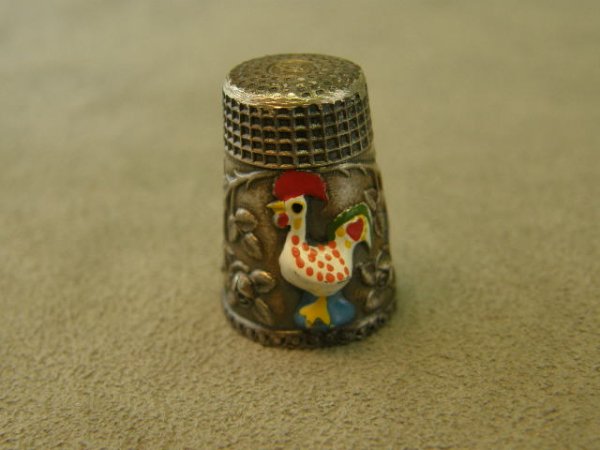 STERLING THIMBLE WITH RAISED ROOSTER FIGURE