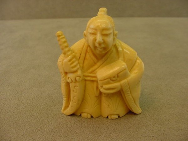 SIGNED CARVED IVORY NETSUKE