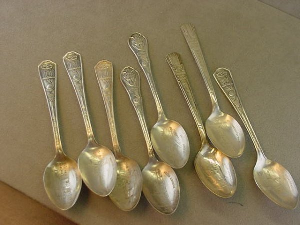 8 SILVERPLATED WORLD'S FAIR SPOONS