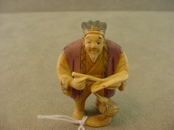 SIGNED CARVED IVORY NETSUKE