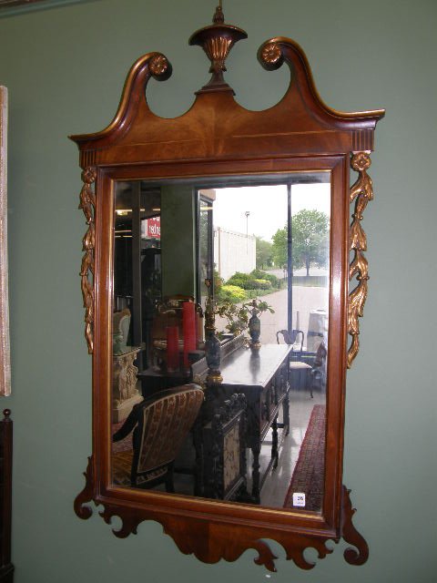 CARVED MIRROR WITH GILT DECORATION