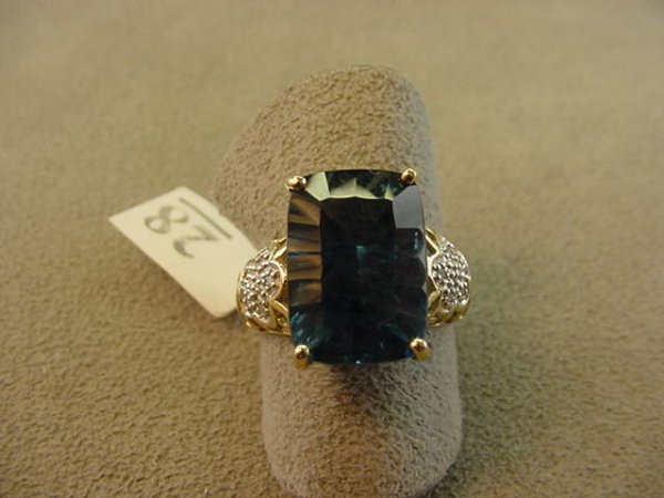 10K GOLD BLUE TOPAZ AND DIAMOND RING