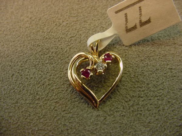14K GOLD RUBY AND DIAMOND HEART PENDANT