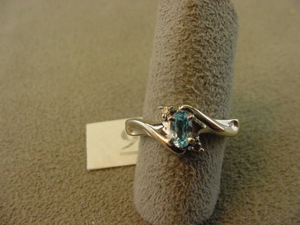 10K WHITE GOLD BLUE TOPAZ AND DIAMOND RING