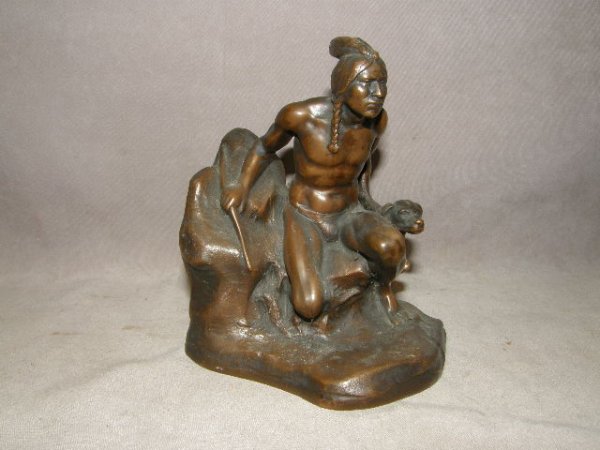 BRONZE CLAD INDIAN AND DOG FIGURAL GROUP