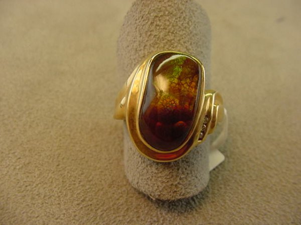1 14K GOLD RING SET WITH 1 FIRE AGATE SIZE 7 1/2