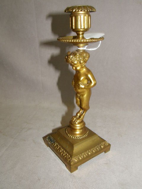 BRONZE FIGURAL CANDLESTICK