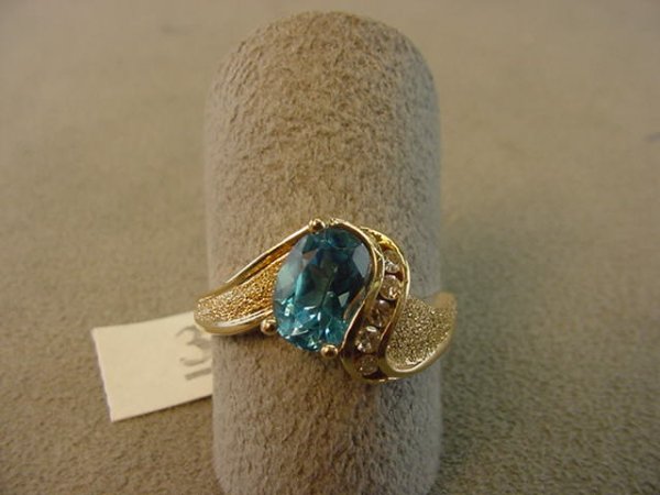 14K GOLD BLUE TOPAZ AND DIAMOND RING