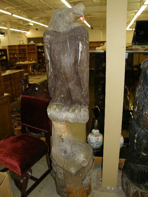 CHAIN SAW CARVING OF AN EAGLE