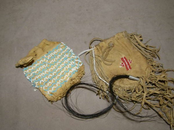 2 BEADED BAGS -1 LEATHER, 1 HIDE