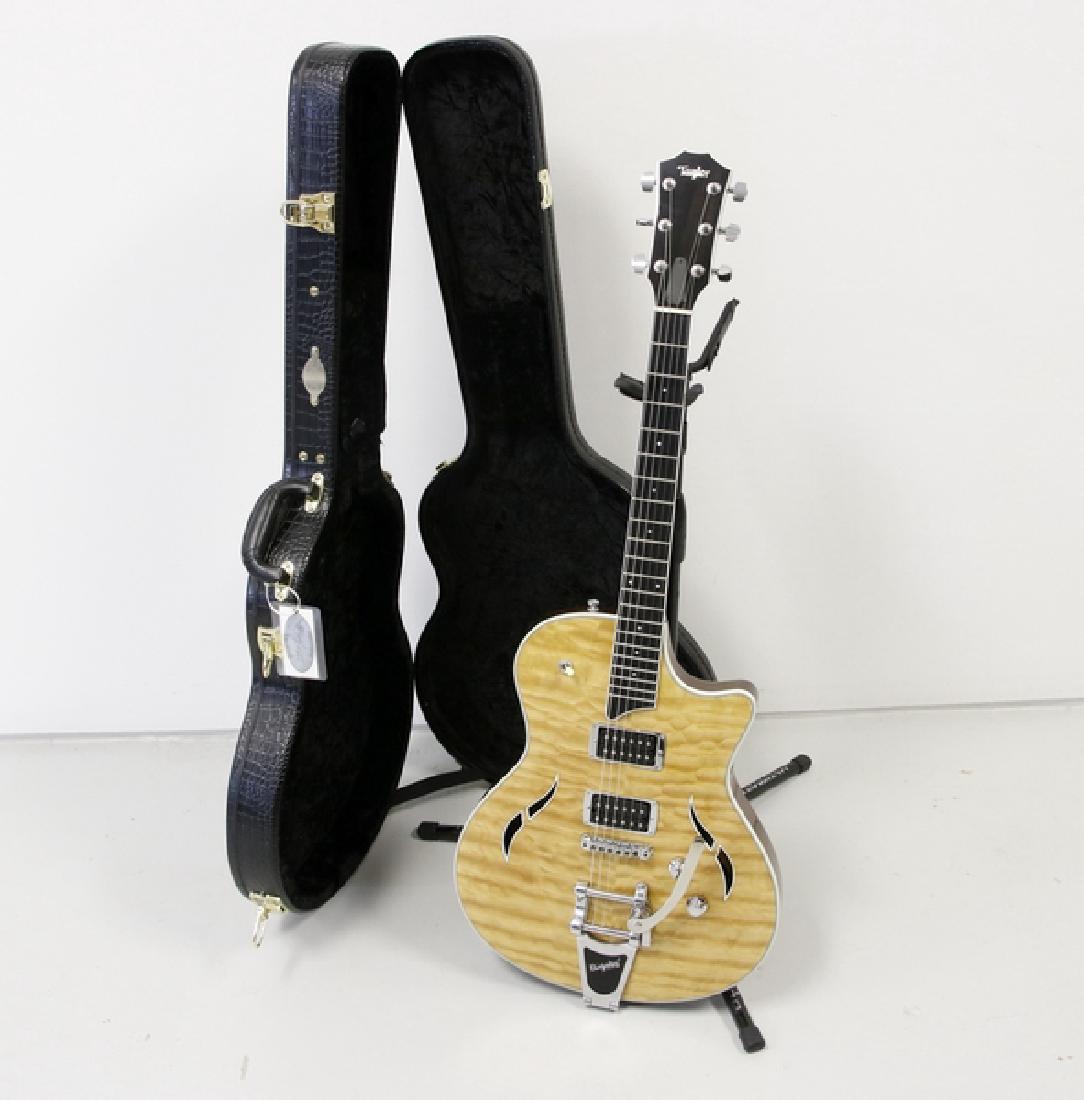 Guitar Taylor Electric Guitar - T3/B Natural Classic: Taylor Electric Guitar - T3/B Natural Classic Semi-Hollowbody Sound and applied signature Taylor design touches, led by proprietary pickups, to create an even more inspiring playing experience. Standa