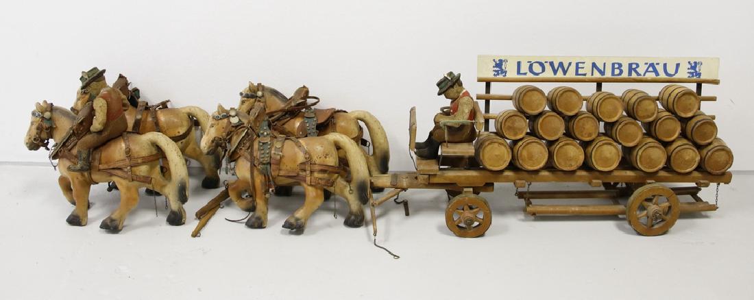 Lowenbrau Horse & Wagon German Beer Advertisement: Made during the 1950s by the Western German Toy Company, Steha, this wooden Beer Barrel Wagon with Clydesdale Horses and Men were a classic Advertising piece of Lowenbrau German Beer. The 41” long w