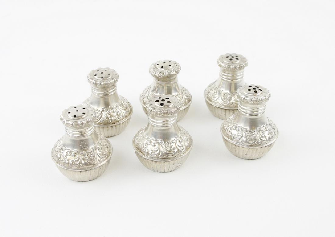 Sterling Silver 19th Century Salt & Pepper Shakers: Six salt & pepper shakers marked sterling. Est weight: 1.58 TOZ, 1" 1/2 X 1" 3/8
