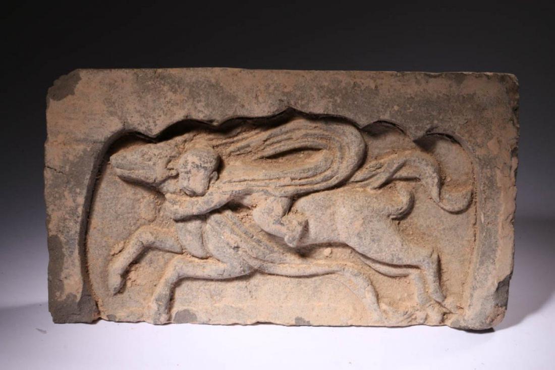 Ancient Chinese Song Dynasty Stone Tile: Grey Chinese stone tile, Song Dynasty, circa 960 - 1279 A.D. Thick stone temple tile of a capped rider on horse back. Dimensions: 9-1/2" L x 5-1/4" H. Provenance: Private collection, New York, NY