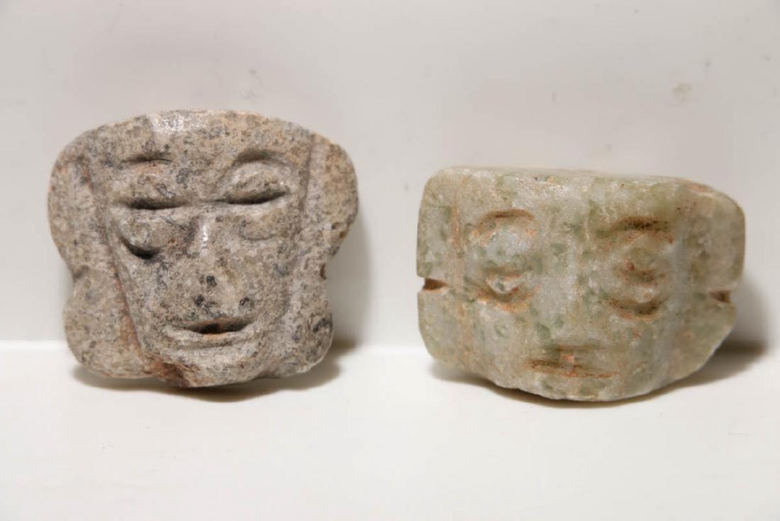 Pre-Columbian Pendante Heads: Pre-Columbian Mexico, Maya, Ca 400 CE. Carved (pendant) heads of humanoid form with suspension holes. Dimensions: 1 H (largest one) Provenance: Ex. Marcel Gibrat collection, acquired at an estate auct