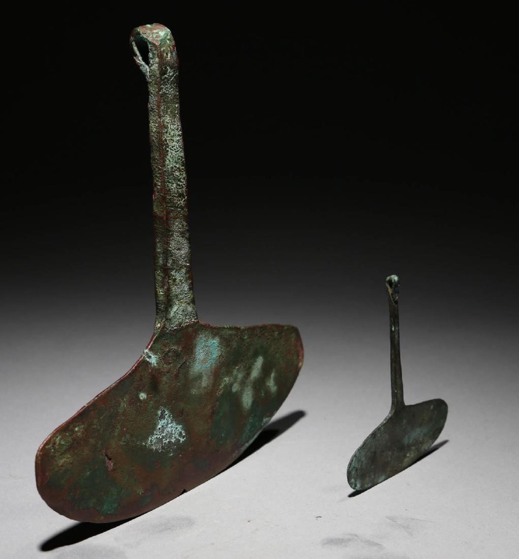 Pre-Columbian Inca Copper Tumis: Pre-Columbian, Peru, circa 1200 to 1400 CE. Classic copper tumis used by the Inca as well as earlier cultures as a knife, often in sacrificial ceremonies. Oblong blade with thick handle folded into a
