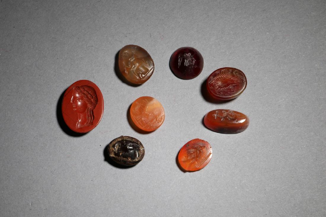 Ancient Roman Intaglios - Lot of 8: Roman intaglios, carnelian, jasper. Various designsNote: This lot has a reserve. To win lot reserve must be met.