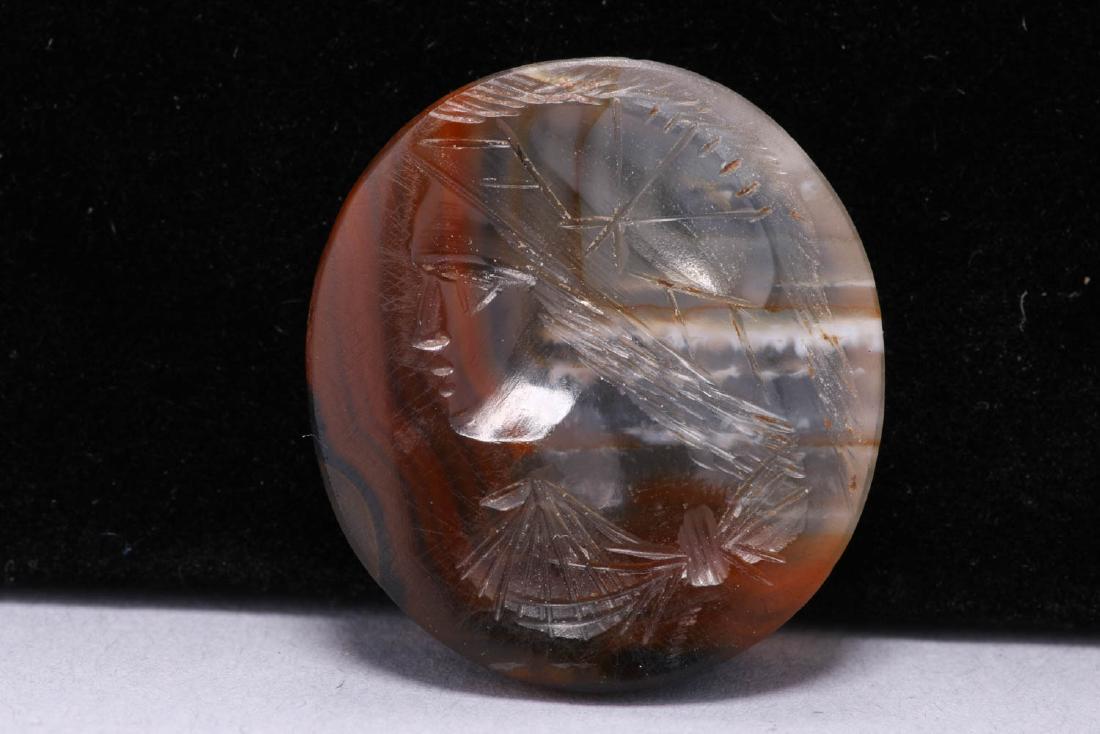 Agate Intaglio: Intaglio of a woman in profile wearing a hat.