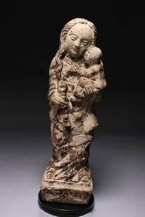 Limestone Carving of Mother and Child: Medieval limestone carving of mother and child Remains of pigmenation. Dimensions: 13" H; Weight: 5 lbs. 12 oz. Provenance; Ex. Private collection, Brooklyn, NY NOTE: This lot has a reseve.